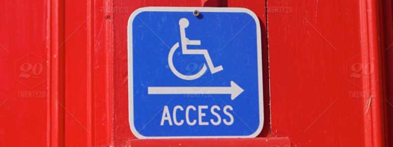 Americans with Disabilities - handicapped sign on a red door